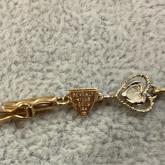 Beverly Hills Gold: 14k.tri colored gold heart shaped tennis 7” inch bracelet. - Picture 7 of 8